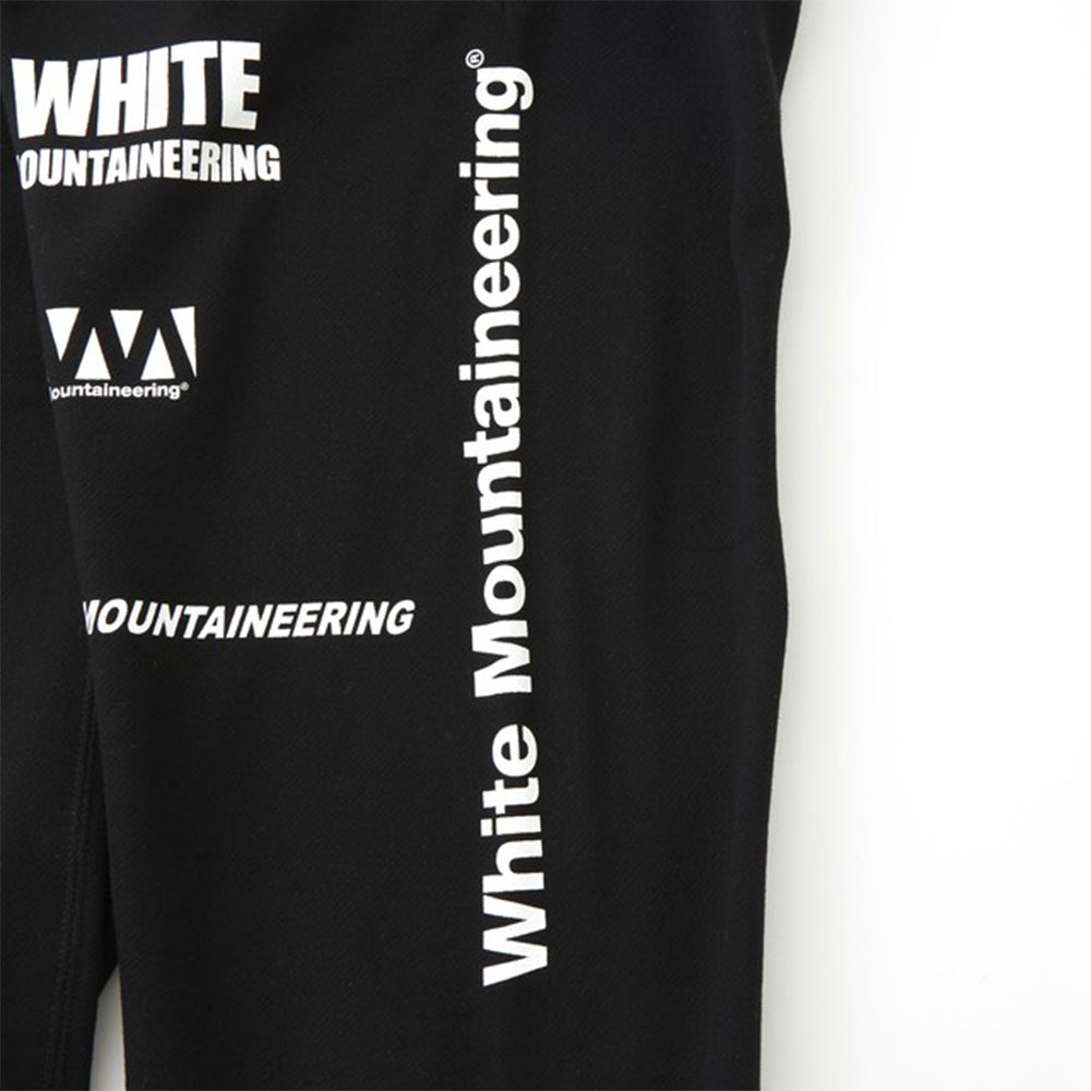 WHITE MOUNTAINEERING WM Logo Randam Printed Pants